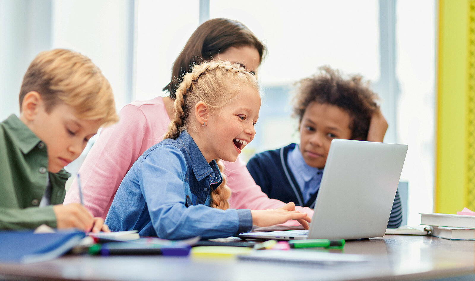 Elementary students enjoying computer science
